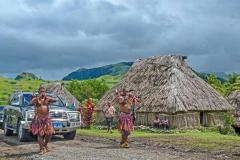 Traditional-warriors-escort-Prime-Minister-Hon.-Voreqe-Bainimarama-to-the-village-green